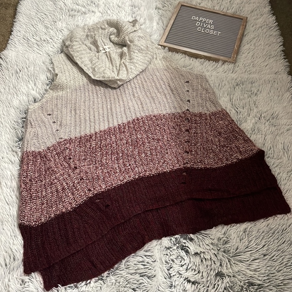Knox Rose sleeveless funnel neck sweater.